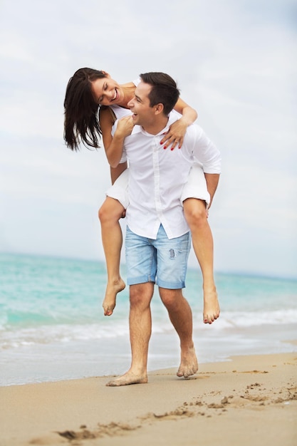 Couple beach cheerful love romance mature embracing