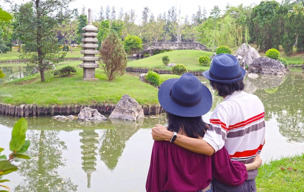 Couple Being Impressed by a Marvelous Japanese Garden