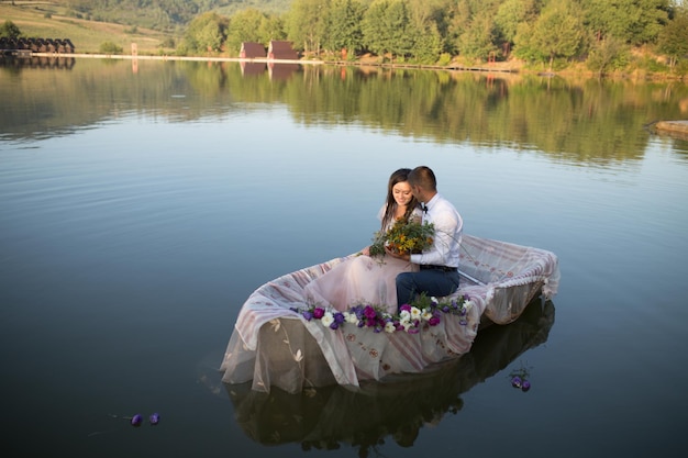 Couple in boat on lake