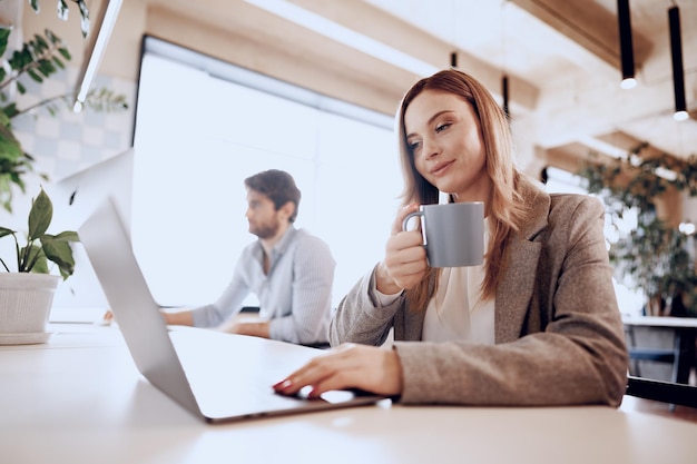 Couple of business partners working together in modern office