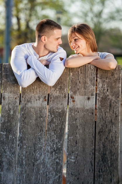 Couple by the fence