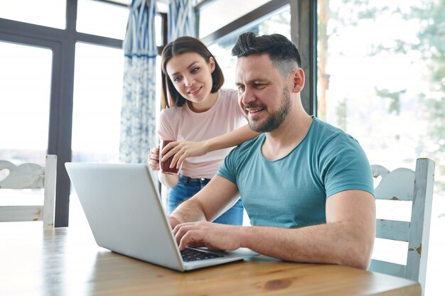 Couple by laptop