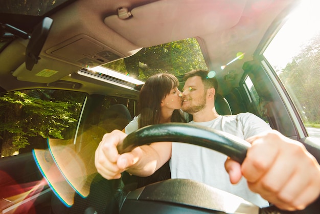 Couple in car long road trip