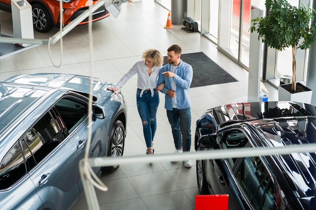 Couple choosing their new car