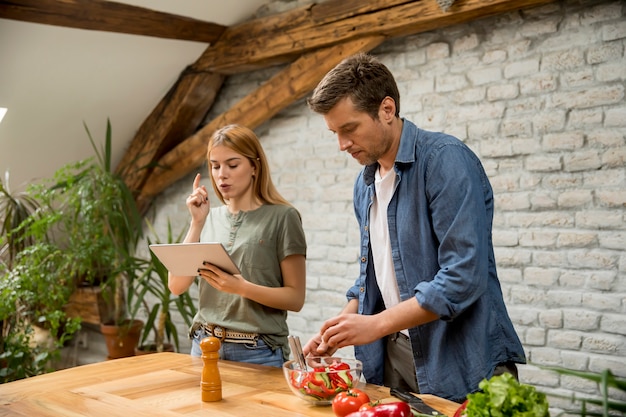 Couple cooking in the modern kitchen