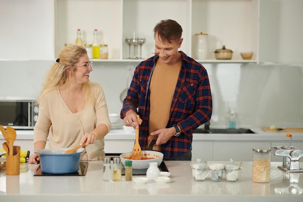 Couple Cooking Spaghetti for Lunch