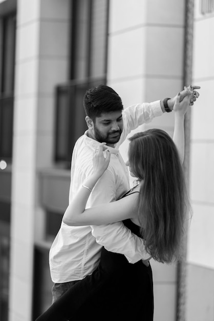 A couple dancing in the city of madrid