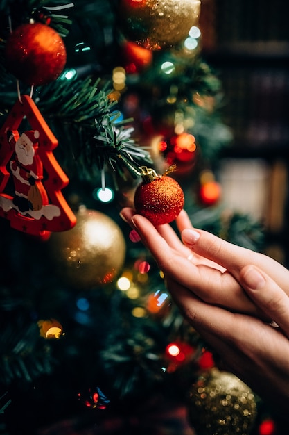 Couple decorating christmas tree