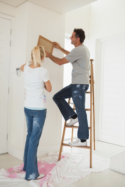 Couple decorating their new house