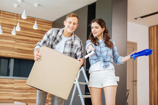 Couple discussing the interior for their future living room