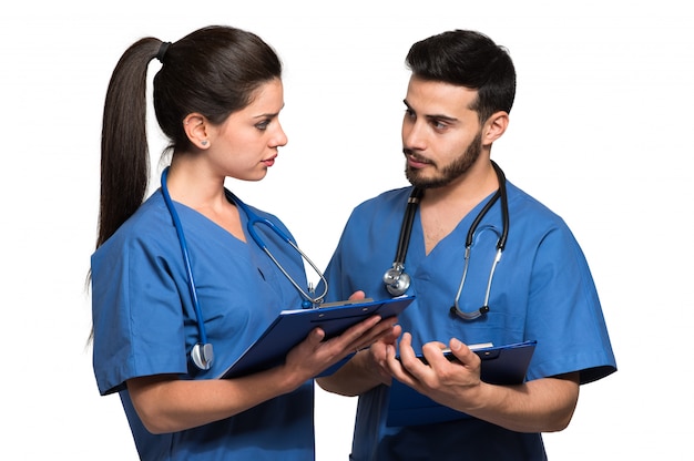 Couple of doctors discussing isolated on white