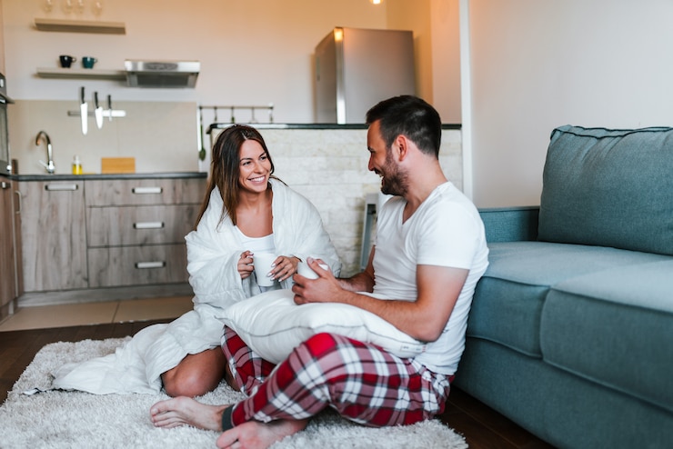 Photo couple drinking coffee in the morning.