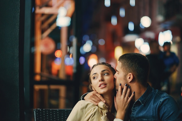 couple drinking coffee outside