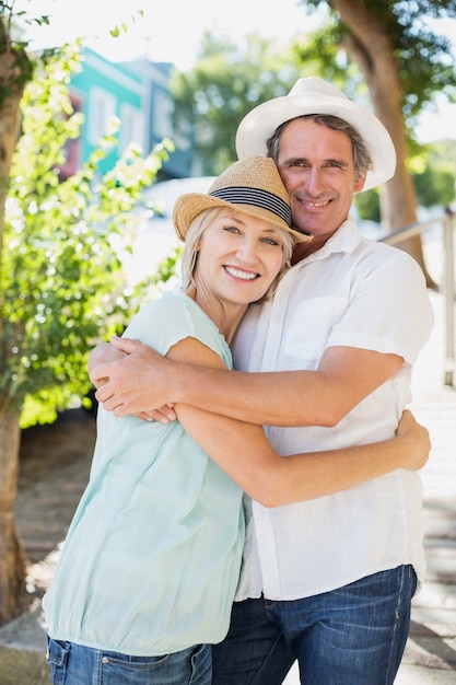 Couple embracing in park