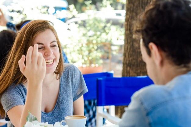 Couple enjoying a coffee at the coffee shop