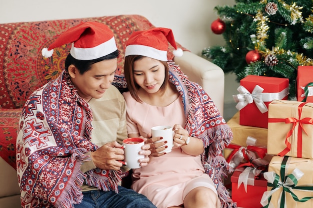 Couple enjoying cozy Christmas