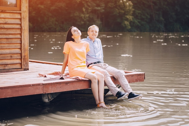 Couple enjoying on the lake