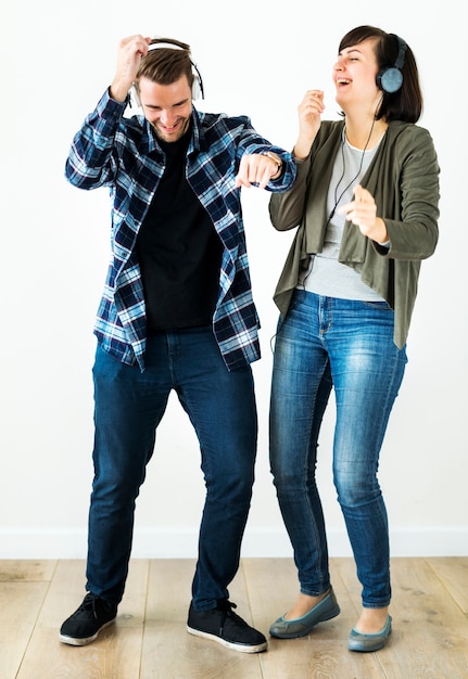 Couple enjoying the music isolated