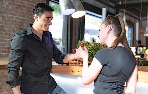 Couple enjoying party in pub