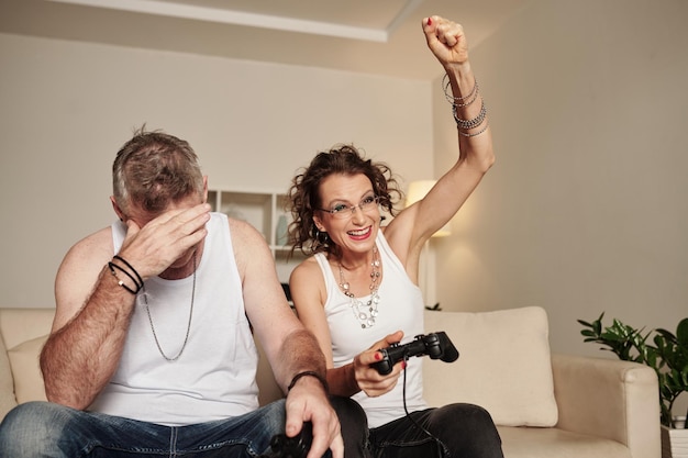 Couple Enjoying Playing Videogame