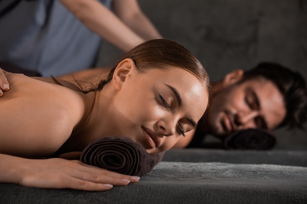 Couple enjoying spa procedures