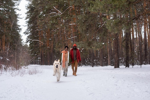 Couple enjoying the walk in the forest