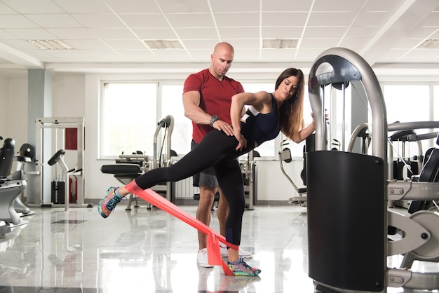 Couple Exercising With a Resistance Band