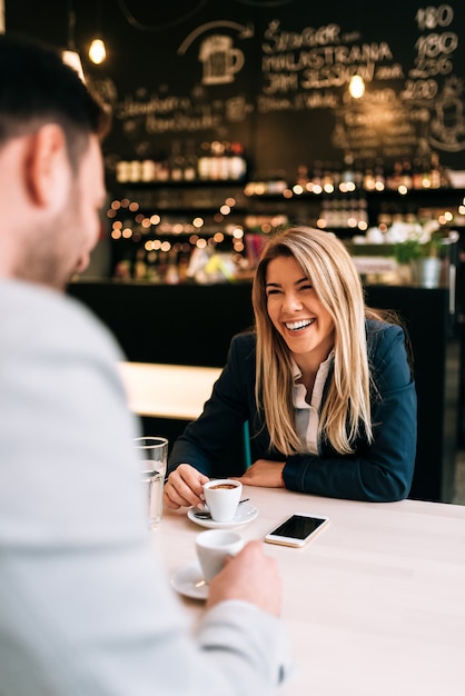 Couple on a first date at the cafe.