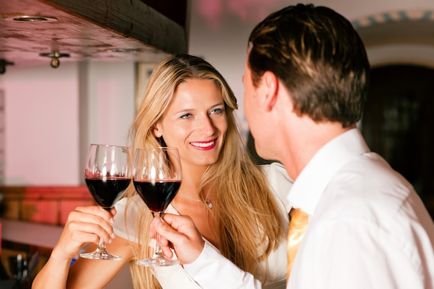 Couple flirting in hotel bar