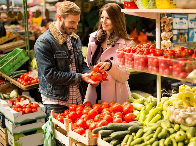 Couple at food market