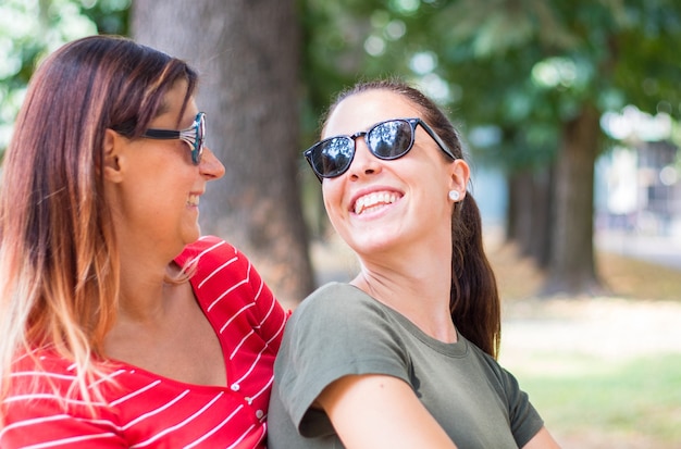 Couple of friends are smiling and having fun outdoor