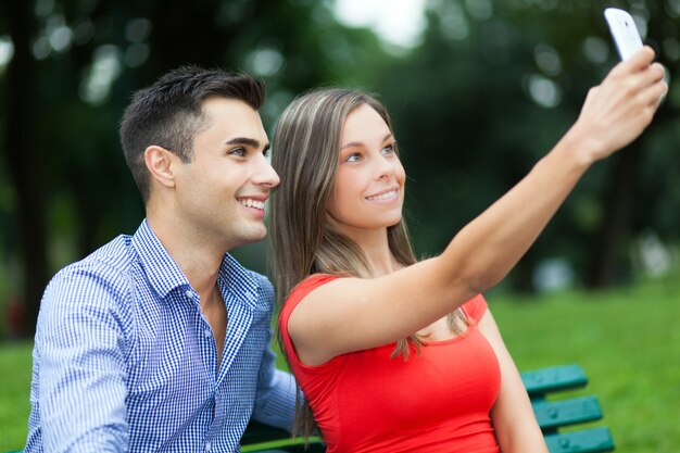 Couple of friends taking a selfie