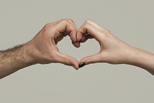 Couple hands in form of heart hands in shape of love heart heart from hands man and woman hand in he