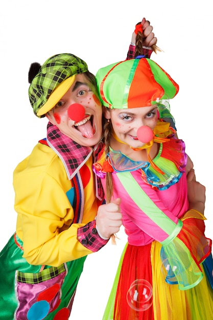 Couple of happy clowns. Isolated on a white background