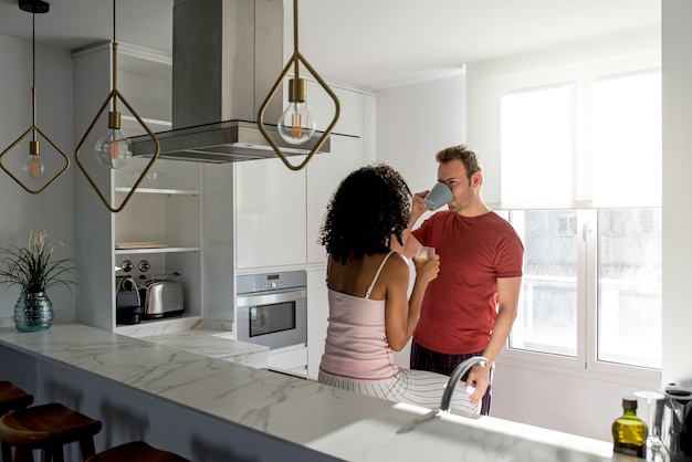 Couple having breakfast at home