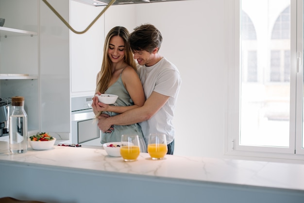 Couple having breakfast at home