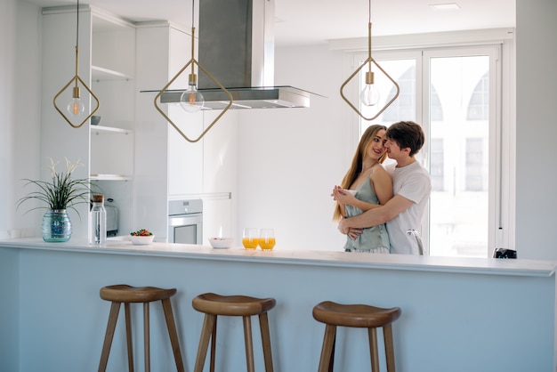 Couple having breakfast at home