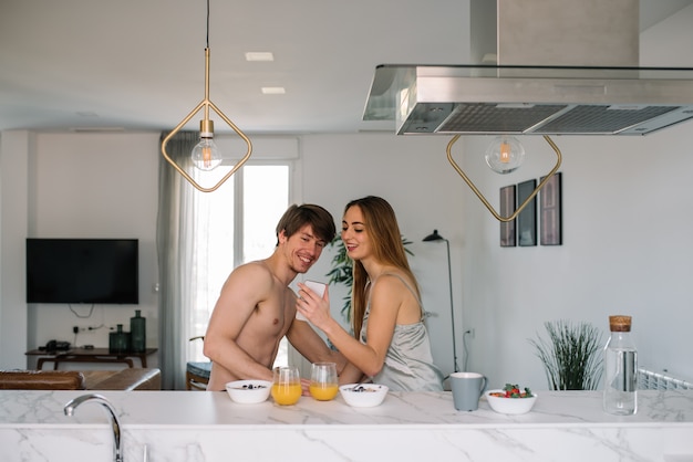 Couple having breakfast at home