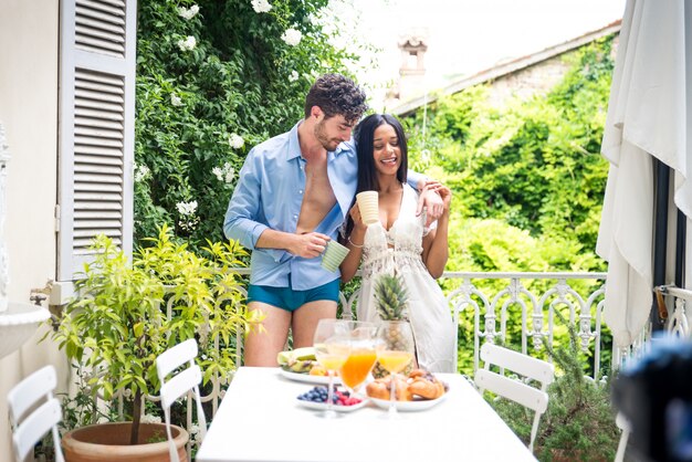 Couple having breakfast at home