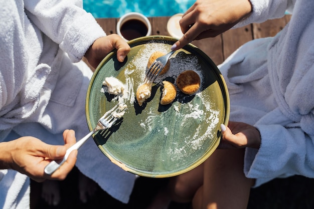 Couple having breakfast in luxury resort Sunny day