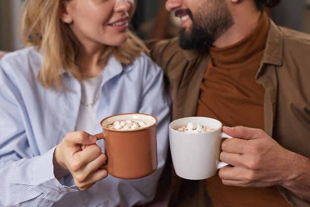 Couple Having Coffee With Marshmallow