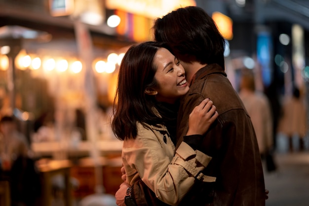 Photo couple having a date at night