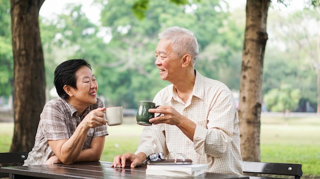 Couple having drink at park