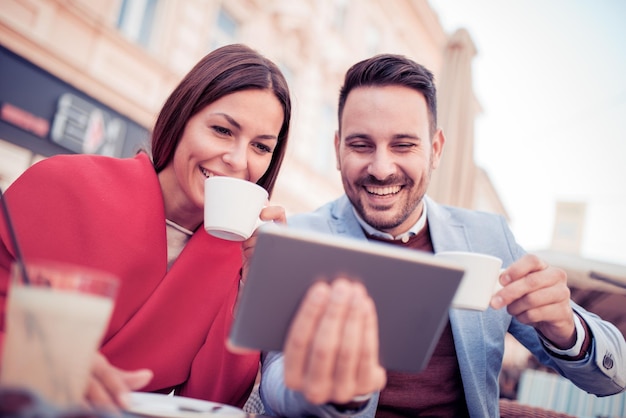 Couple having fun in cafe