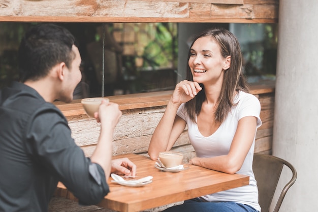 couple having fun at the coffee shop