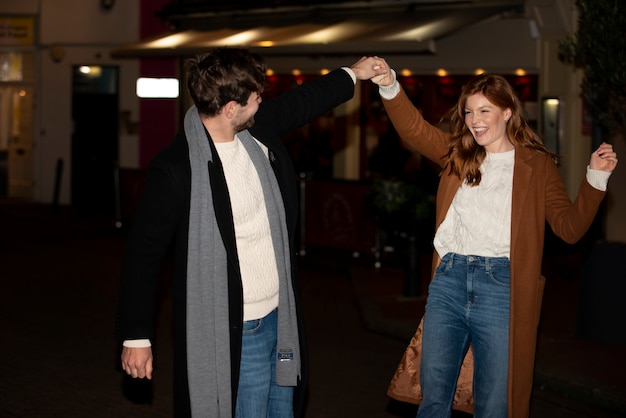 Photo couple having fun at night