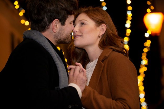 Photo couple having fun at night