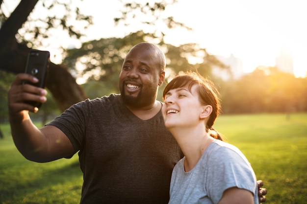 Couple having fun together at the park