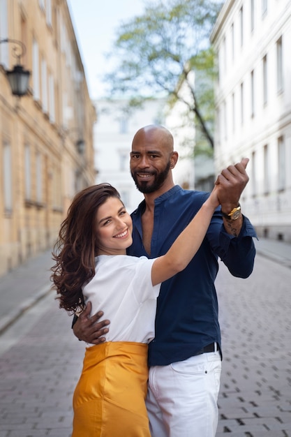 Couple having a latin dance performance in the city