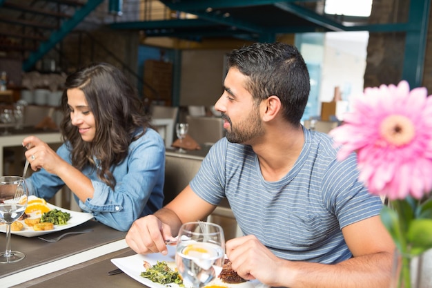 Couple having lunch at rustic gourmet restaurant